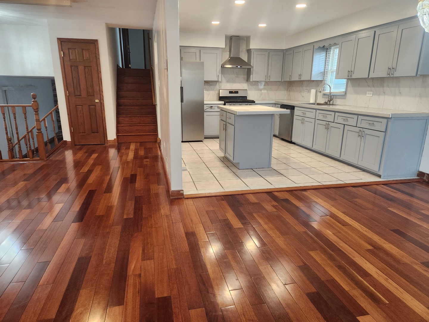 11723 South Ave J Chicago, IL 60617 - Photo 12 of 32 a large kitchen with cabinets