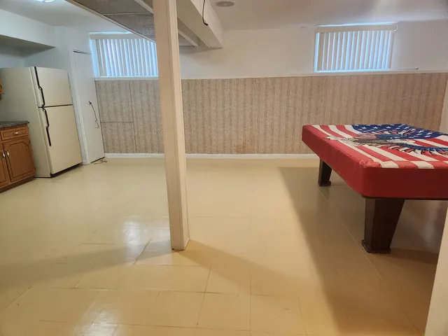 a bathroom with a sink and a shower