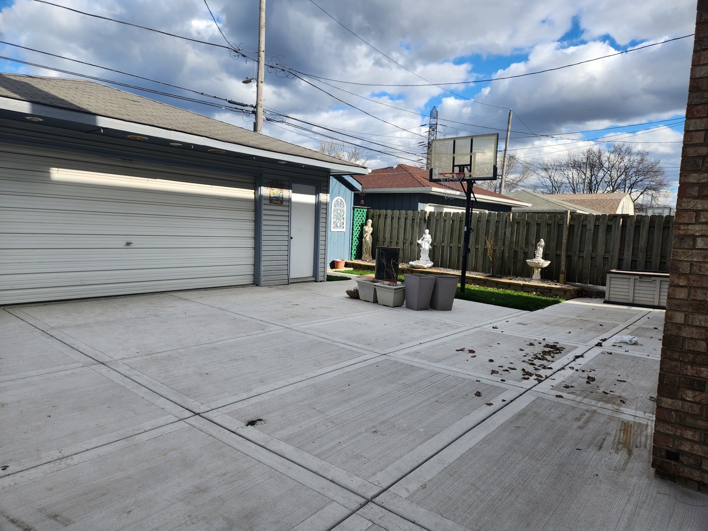 11723 South Ave J Chicago, IL 60617 - Photo 31 of 32 a view of the patio with a table and chairs