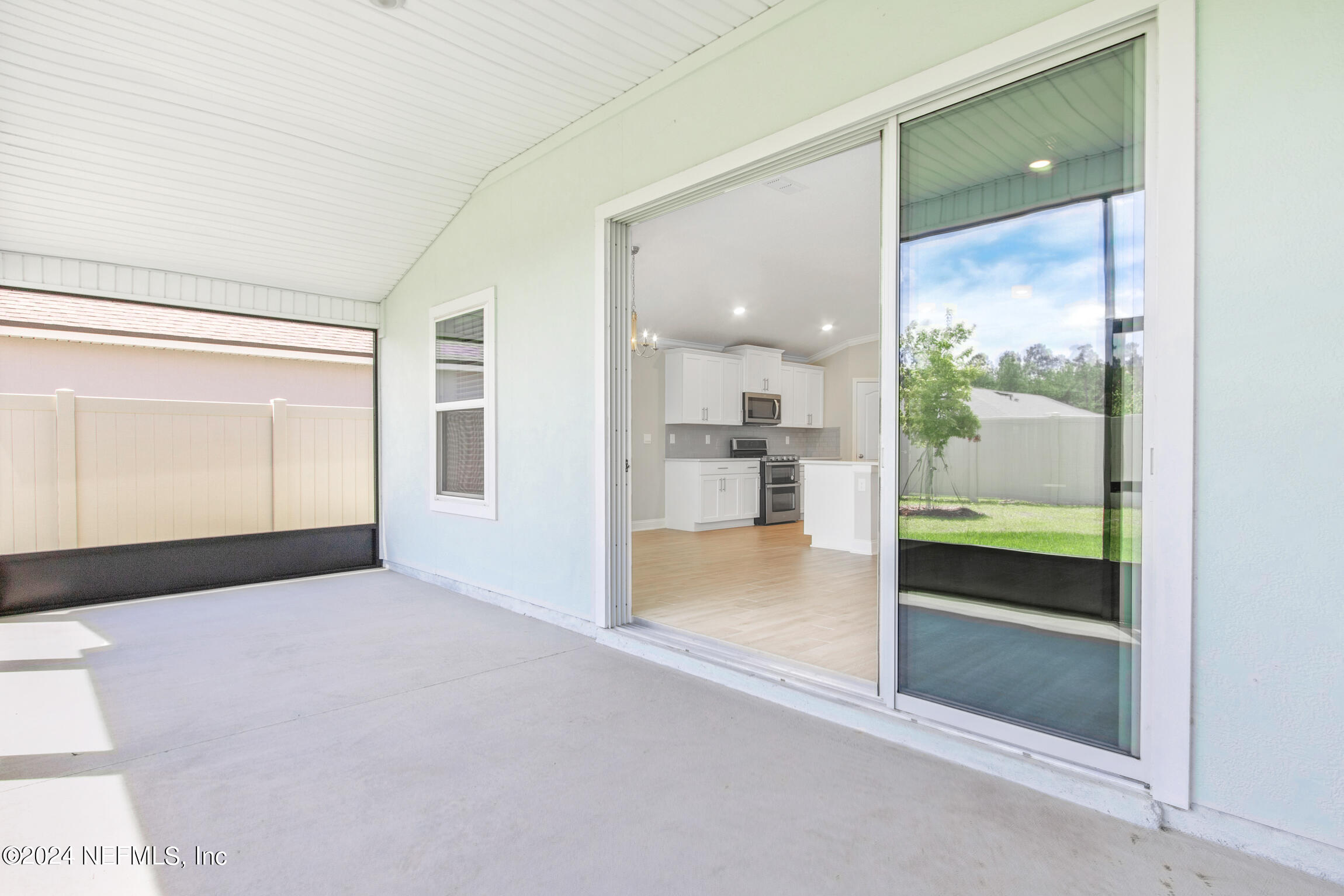 254 Ebro Road St. Augustine, FL 32084 - Photo 15 of 49 a view of a glass door of the hallway