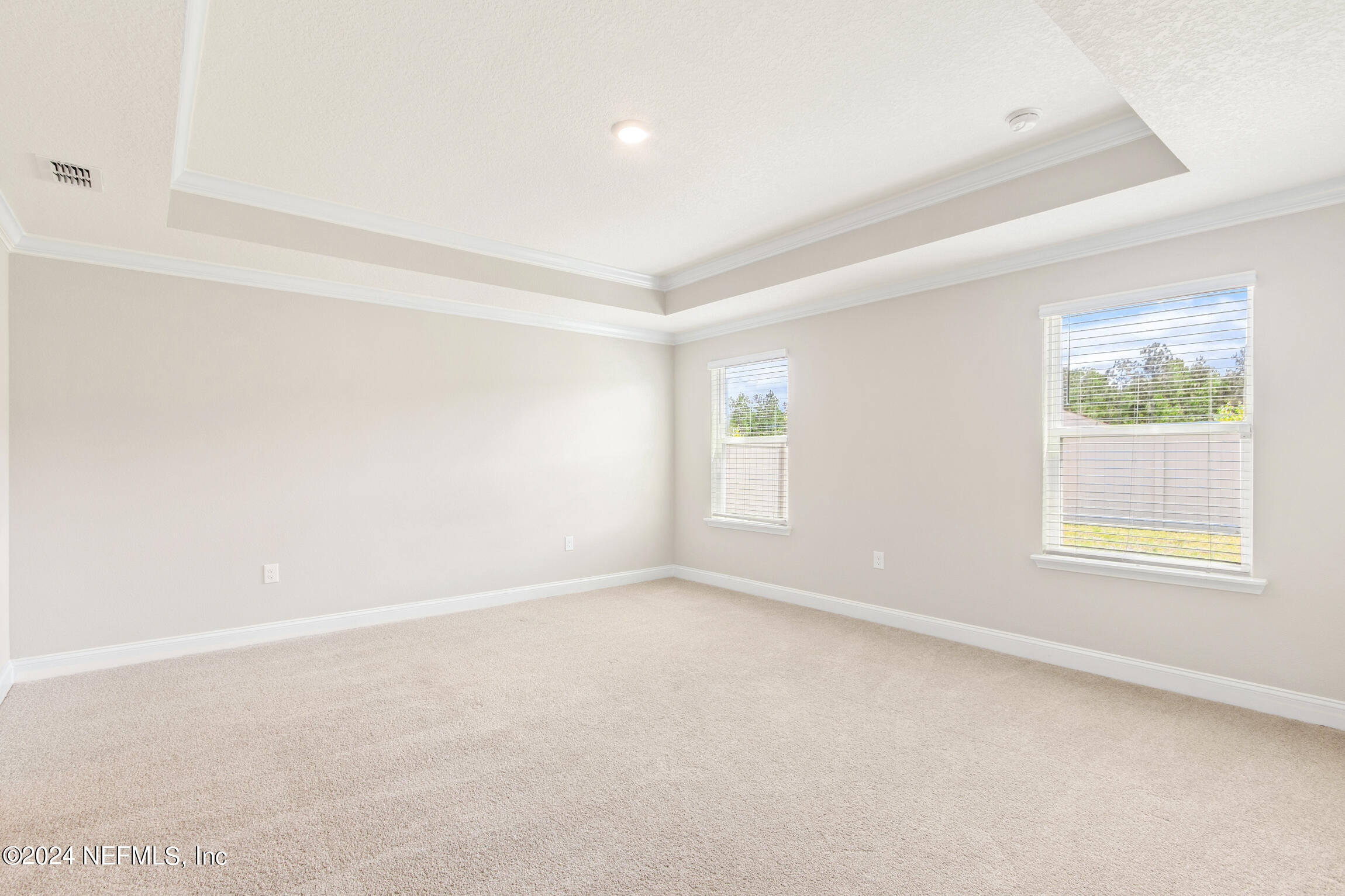 254 Ebro Road St. Augustine, FL 32084 - Photo 17 of 49 an empty room with windows