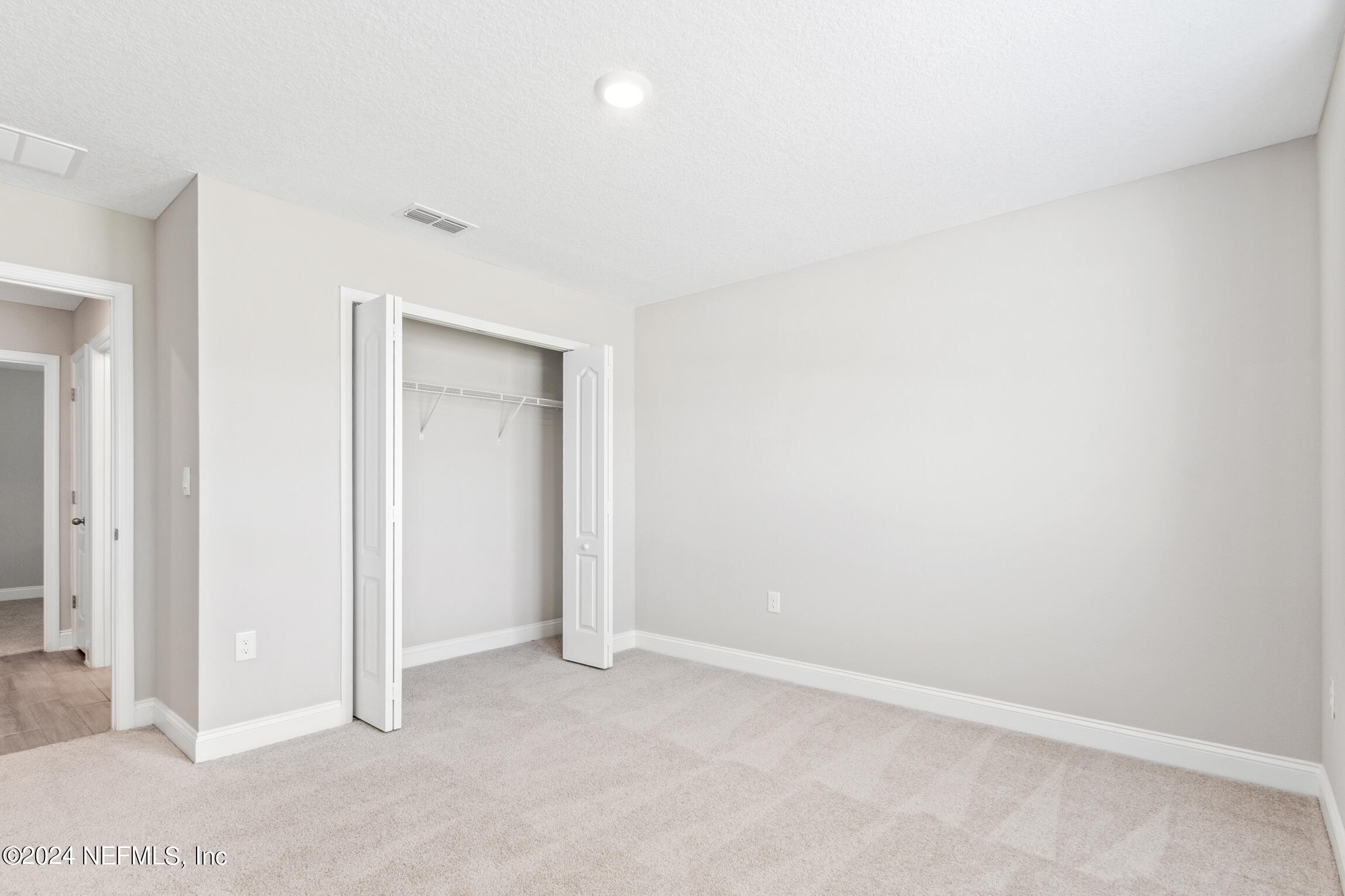 254 Ebro Road St. Augustine, FL 32084 - Photo 28 of 49 an empty room with closet area