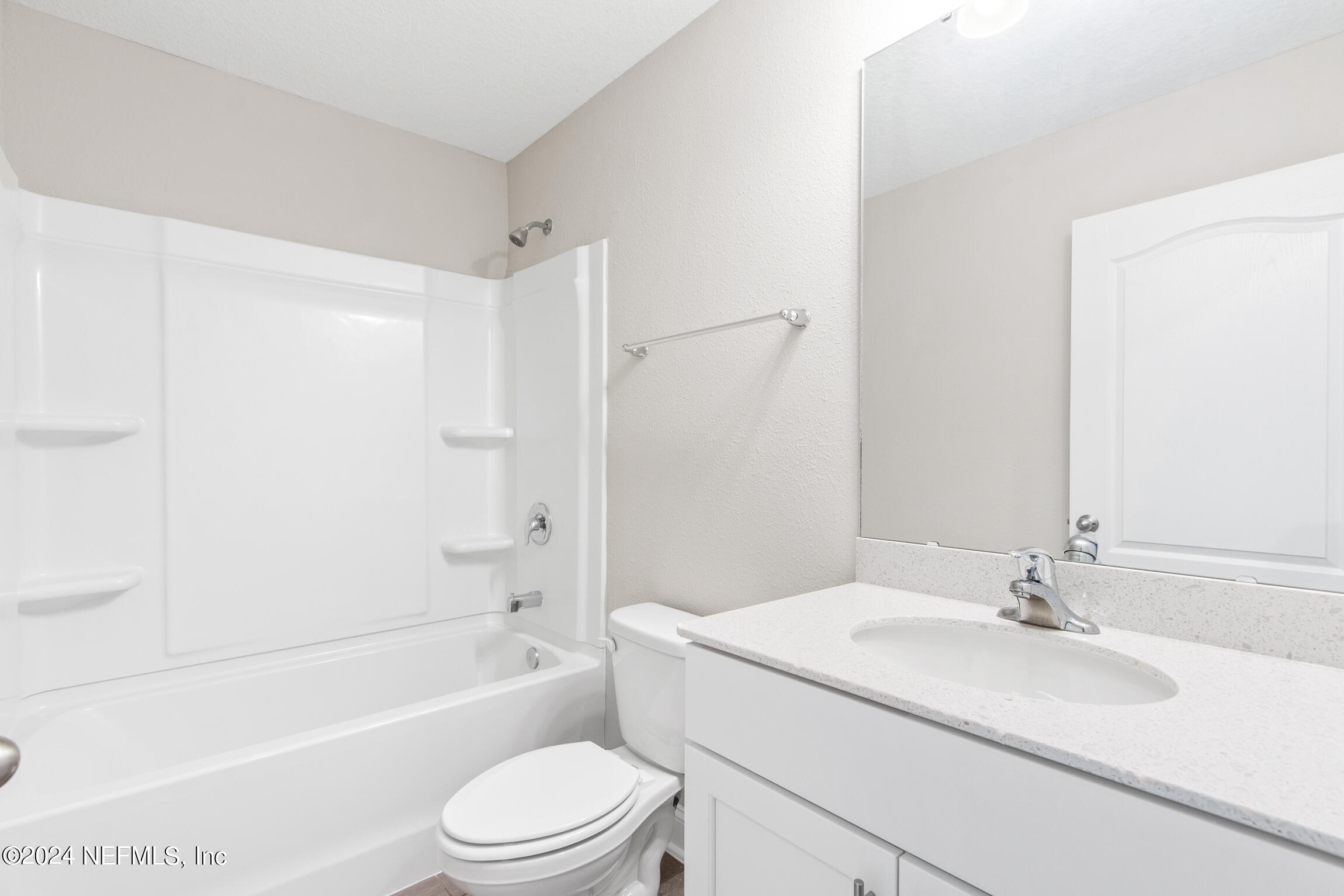 254 Ebro Road St. Augustine, FL 32084 - Photo 29 of 49 a bathroom with a granite countertop sink toilet and shower