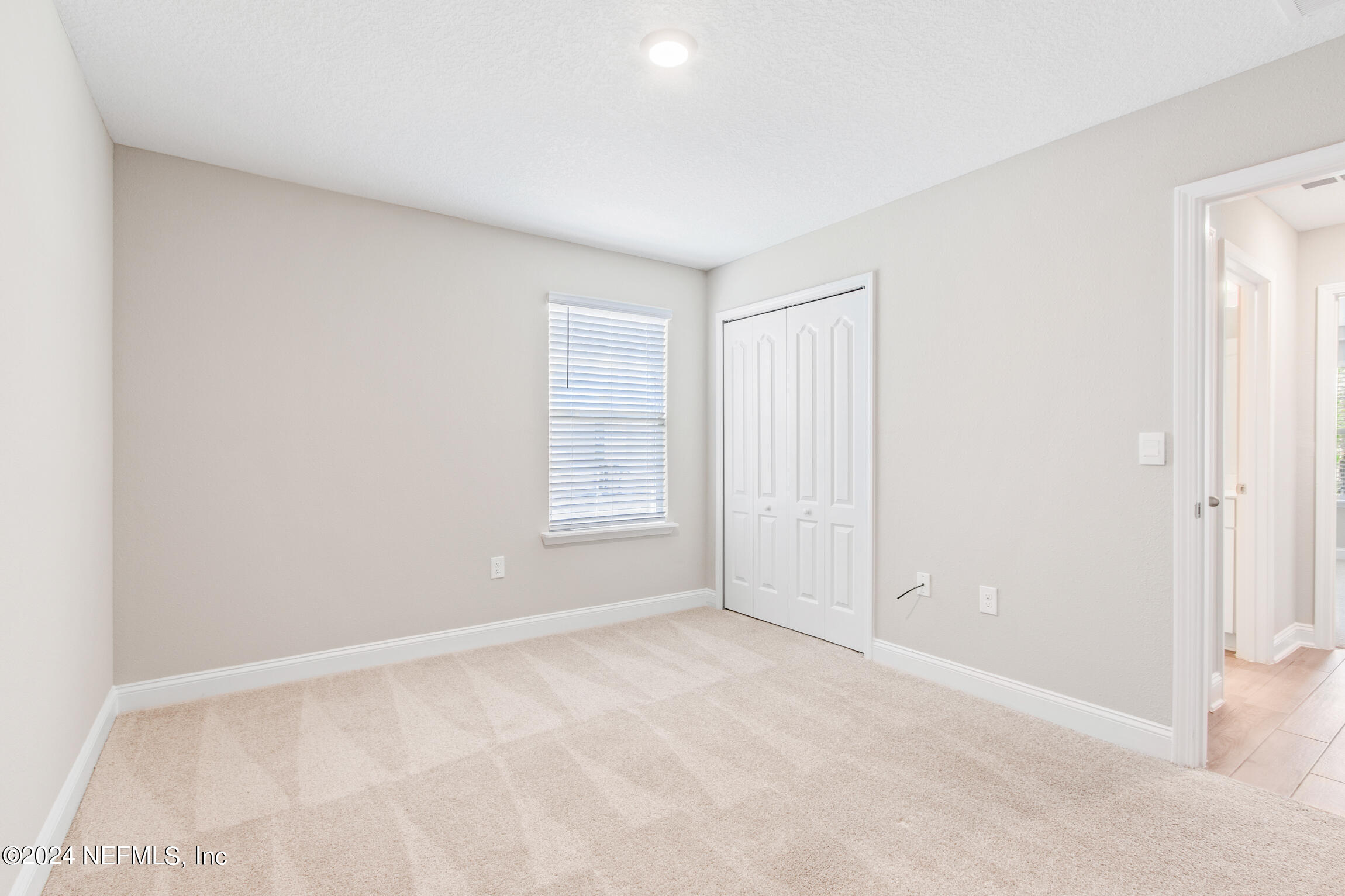 254 Ebro Road St. Augustine, FL 32084 - Photo 30 of 49 an empty room with windows