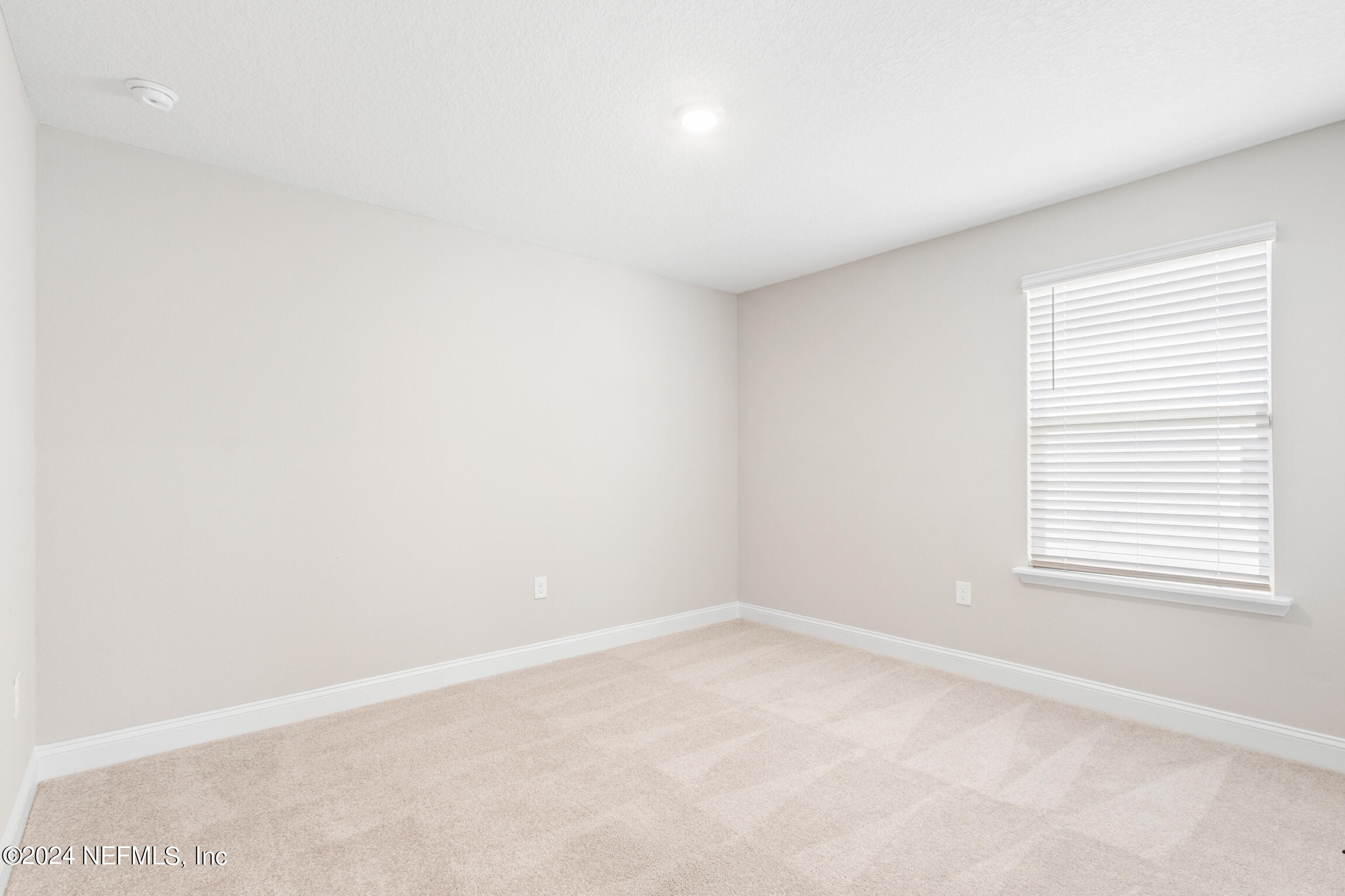 254 Ebro Road St. Augustine, FL 32084 - Photo 31 of 49 an empty room with a window