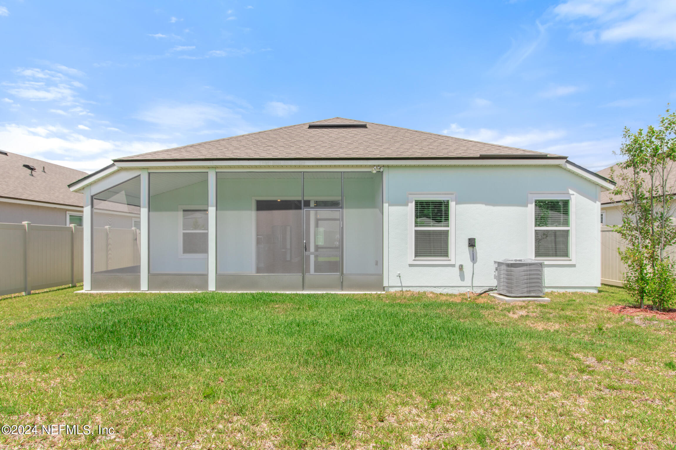 254 Ebro Road St. Augustine, FL 32084 - Photo 32 of 49 a front view of house with yard and green space