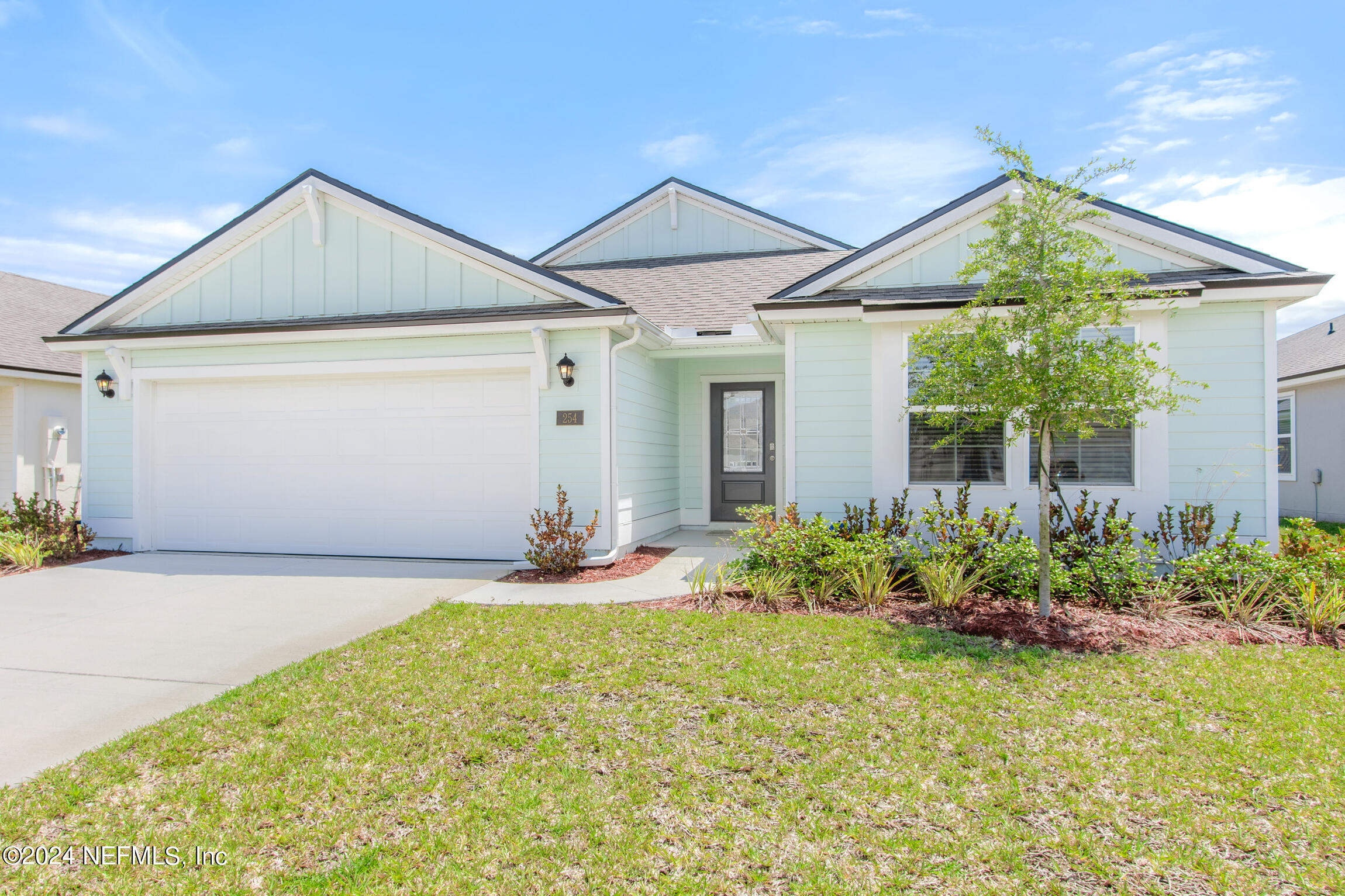 254 Ebro Road St. Augustine, FL 32084 - Photo 38 of 49 a view of a house with garden
