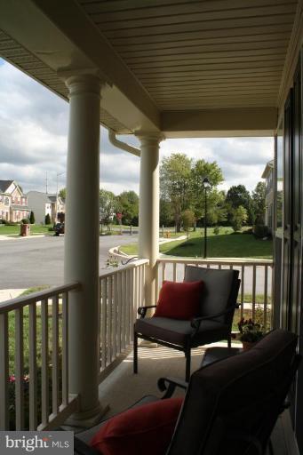 5627 New Forge Road White Marsh, MD 21162 - Photo 2 of 30 a outdoor sitting area with furniture and wooden deck