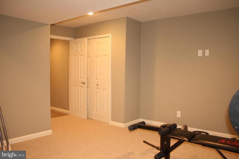 5627 New Forge Road White Marsh, MD 21162 - Photo 17 of 30 a view of a room with gym equipment