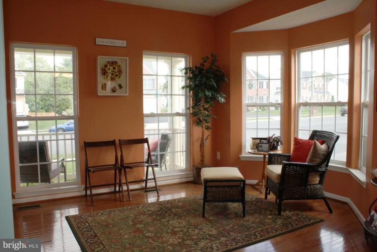 5627 New Forge Road White Marsh, MD 21162 - Photo 27 of 30 a living room with furniture and a window