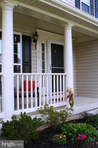 5627 New Forge Road White Marsh, MD 21162 - Photo 28 of 30 a front view of a house with a garden