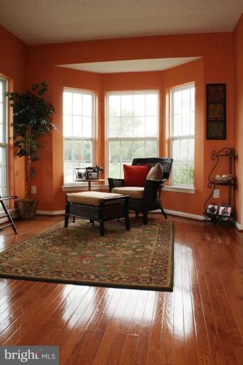 5627 New Forge Road White Marsh, MD 21162 - Photo 4 of 30 a living room with furniture and a large window