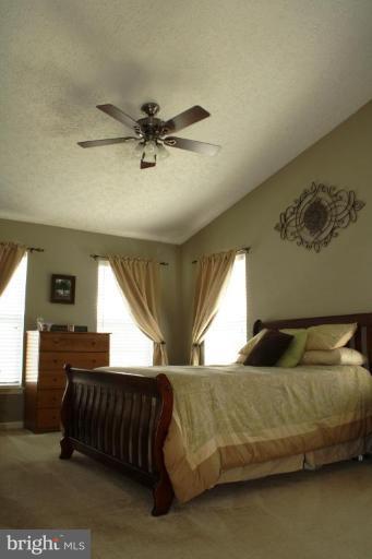 5627 New Forge Road White Marsh, MD 21162 - Photo 10 of 30 a bedroom with a bed and window