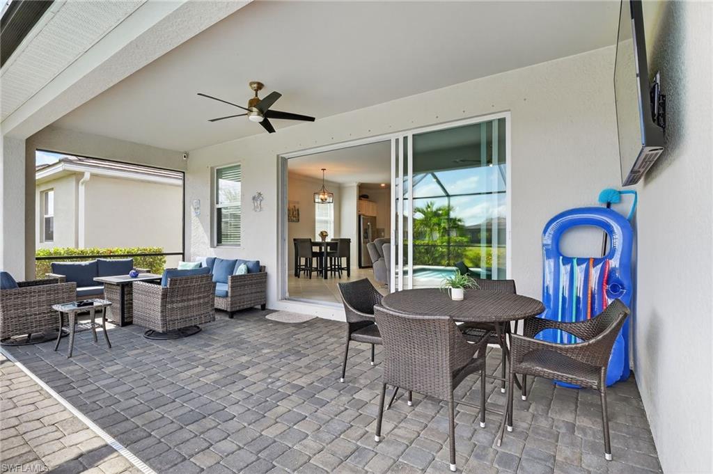 2130 Hamlin Street Naples, FL 34120 - Photo 29 of 43 a view of a dining room with furniture window and outside view
