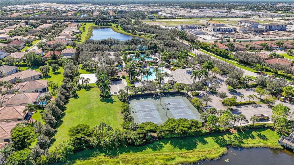 2130 Hamlin Street Naples, FL 34120 - Photo 37 of 43 an aerial view of residential houses with outdoor space and trees