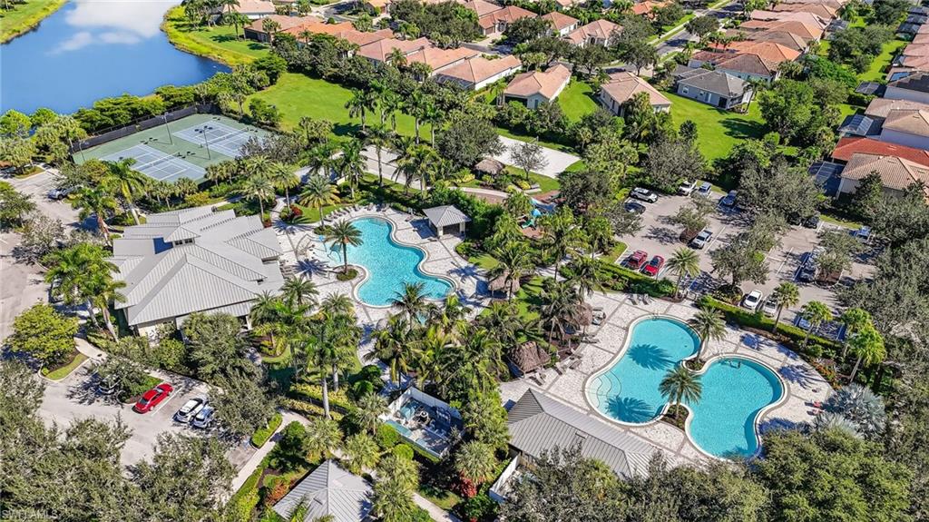 2130 Hamlin Street Naples, FL 34120 - Photo 40 of 43 an aerial view of residential house with outdoor space and trees all around
