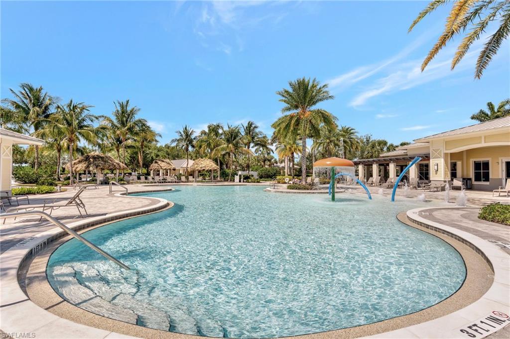 2130 Hamlin Street Naples, FL 34120 - Photo 42 of 43 a view of a swimming pool with a yard