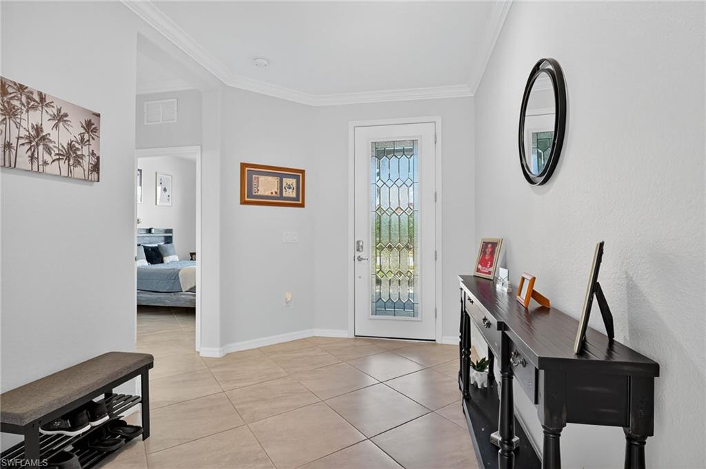 2130 Hamlin Street Naples, FL 34120 - Photo 5 of 43 a view of a livingroom with furniture and a window