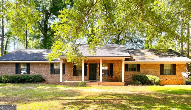 a view of a house with a swimming pool