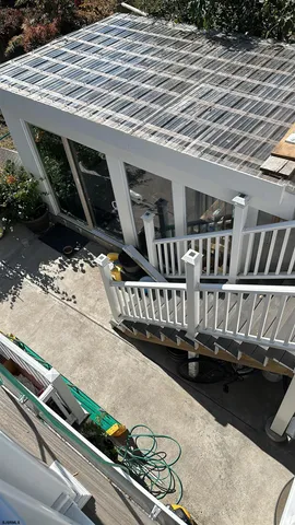 a view of balcony with wooden floor