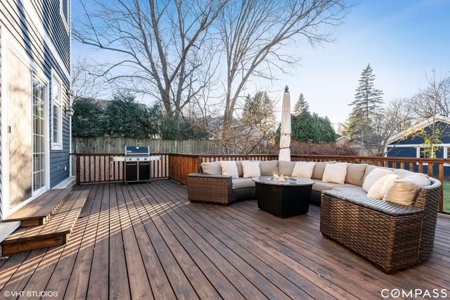 a view of roof deck with patio