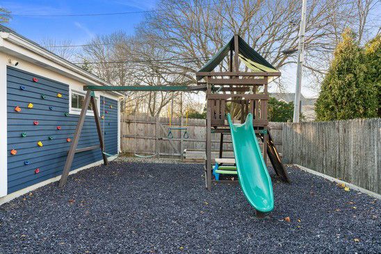 a view of a park with a slide