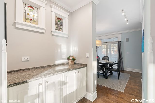 a living room with granite countertop furniture and fireplace