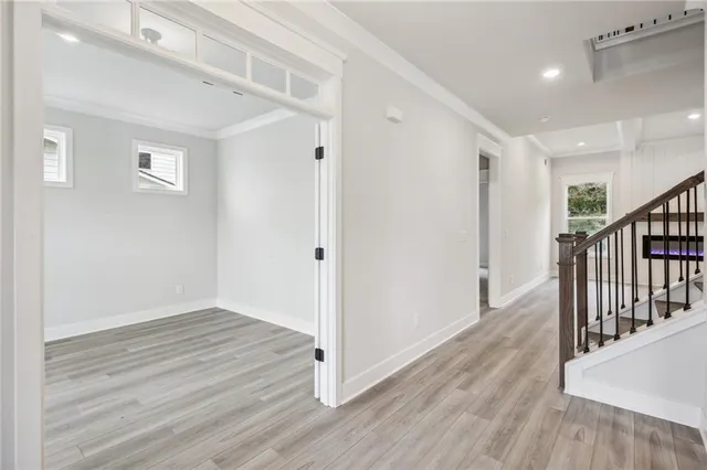 a bathroom with a double vanity sink a large mirror and shower