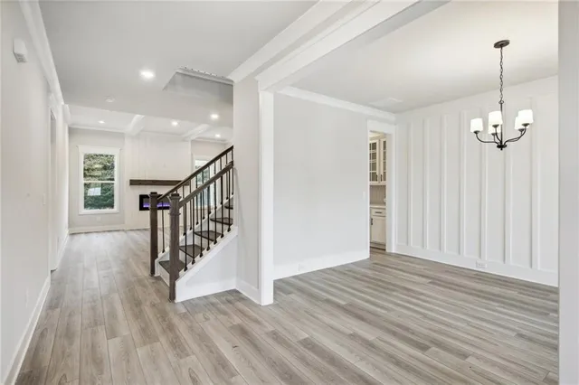 a bathroom with a shower sink and toilet