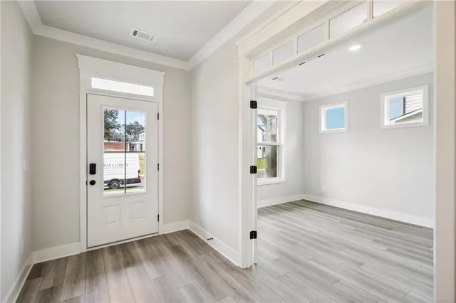 a view of a hallway with staircase