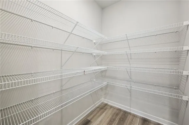 a view of a house with swimming pool and a yard