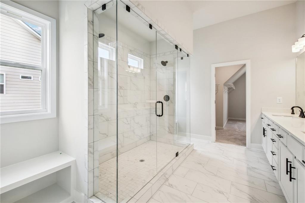 368 Scarlet Rose Way Hoschton, GA 30548 - Photo 42 of 150 a bathroom with a shower sink and toilet