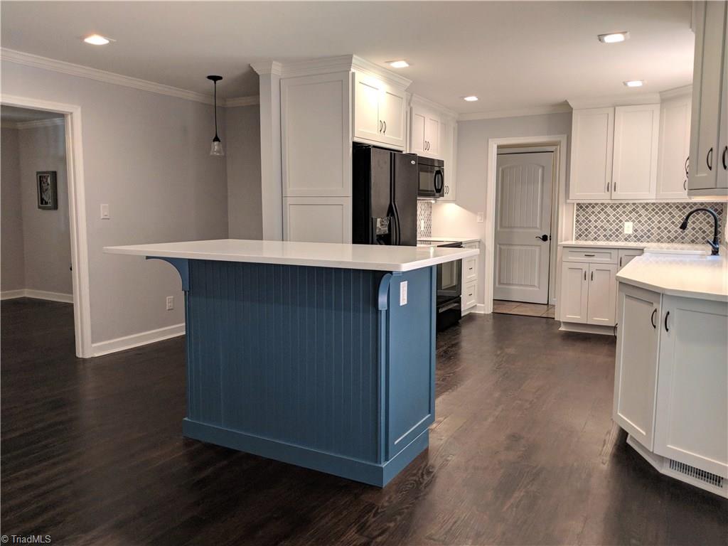 550 Pepperidge Road Lewisville, NC 27023 - Photo 11 of 30 Cute breakfast nook/ office spot to the left, and a kitchen with a drool-worthy makeover!