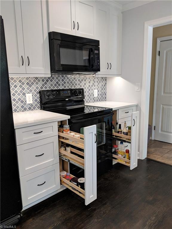 550 Pepperidge Road Lewisville, NC 27023 - Photo 15 of 30 Built-in spice racks and awesome pantry.