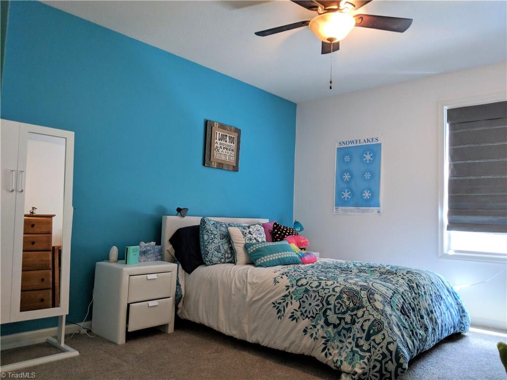550 Pepperidge Road Lewisville, NC 27023 - Photo 20 of 30 2nd bedroom (13x12) has new carpet, windows, and great space.