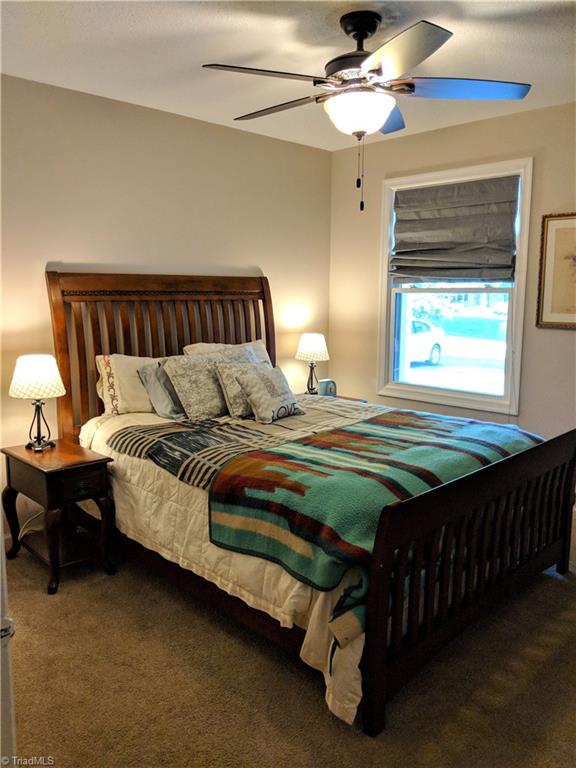 550 Pepperidge Road Lewisville, NC 27023 - Photo 23 of 30 Bedroom 3 updated with new carpet and windows.