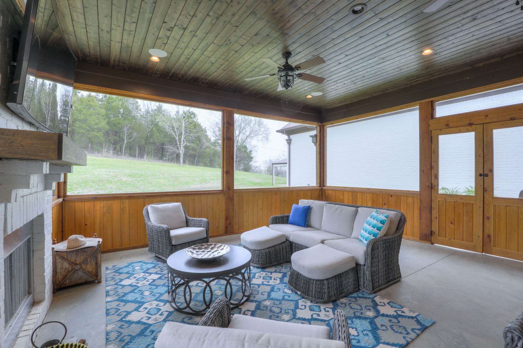 1829 Sedberry Road, Unit 5 Franklin, TN 37064 - Photo 42 of 50 a balcony with furniture and a floor to ceiling window
