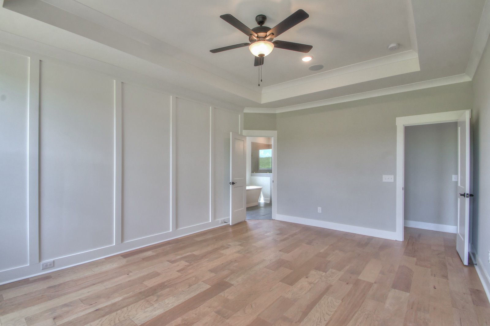 184 Phillips Bend Spring Hill Spring Hill, TN 37174 - Photo 15 of 39 a view of a big room with wooden floor and a ceiling fan