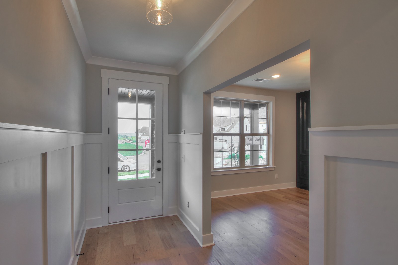 184 Phillips Bend Spring Hill Spring Hill, TN 37174 - Photo 5 of 39 an empty room with wooden floor and windows