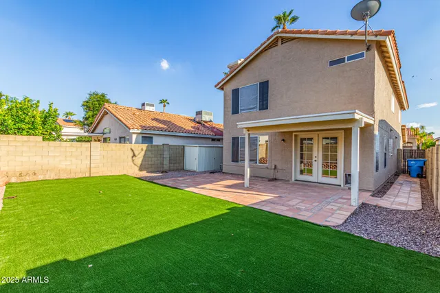 a front view of a house with glass windows