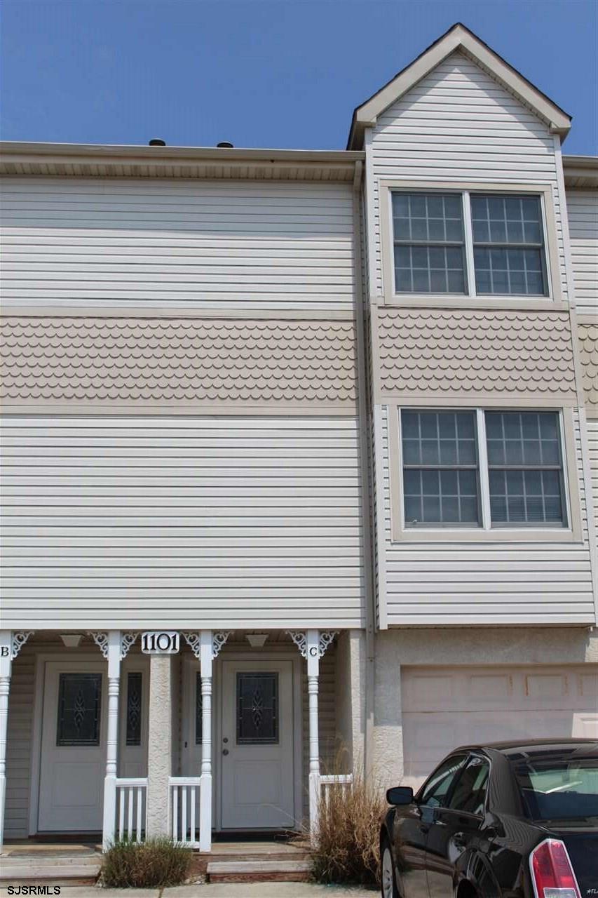 1101 East Shore Drive, Unit C Brigantine, NJ 08203 - Photo 1 of 22 a front view of a house with balcony