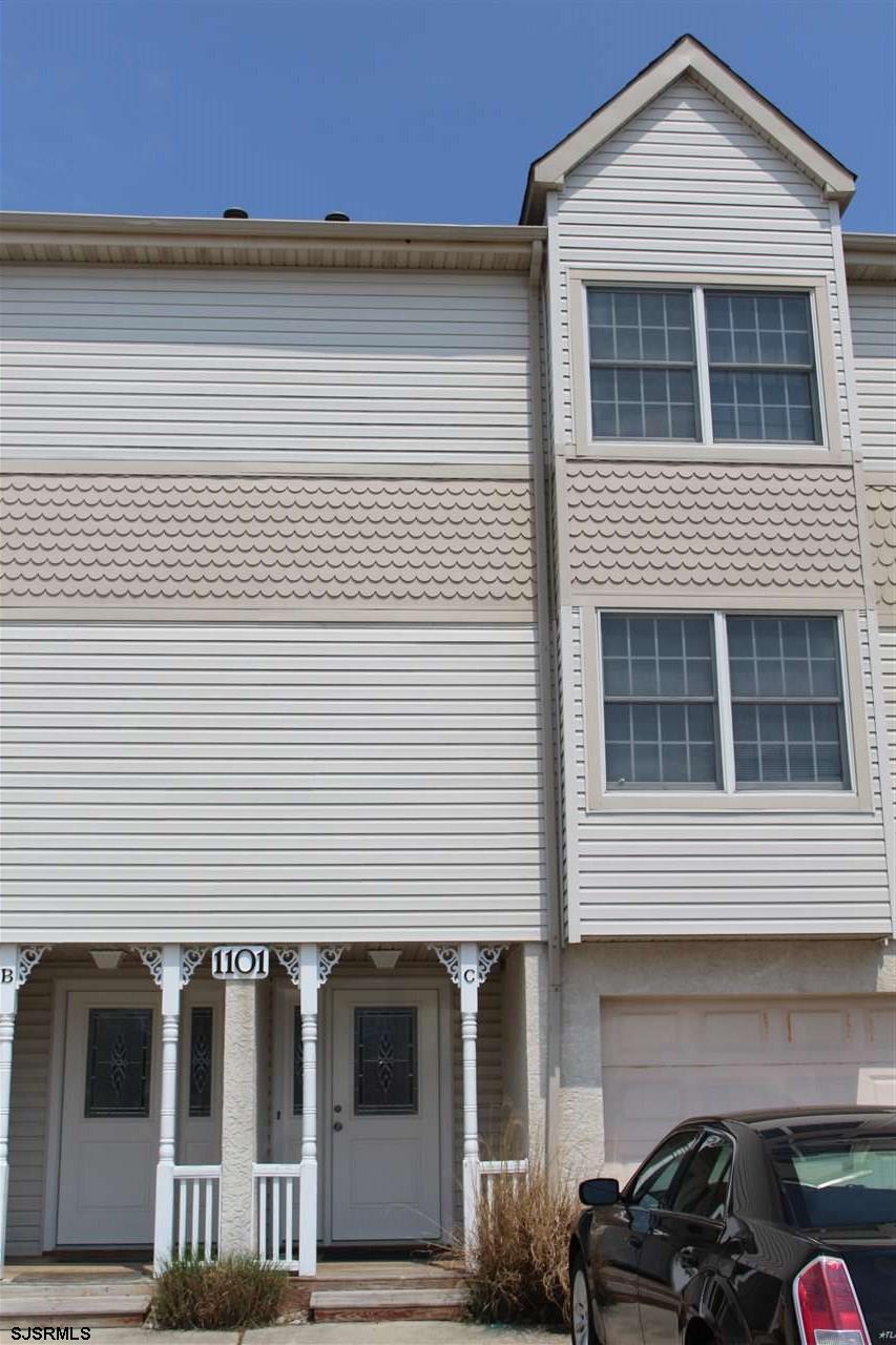1101 East Shore Drive, Unit C Brigantine, NJ 08203 - Photo 2 of 22 a front view of a house with balcony