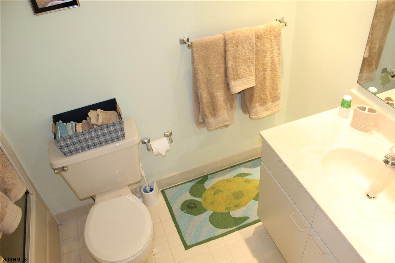 1101 East Shore Drive, Unit C Brigantine, NJ 08203 - Photo 17 of 22 a bathroom with a toilet and a sink