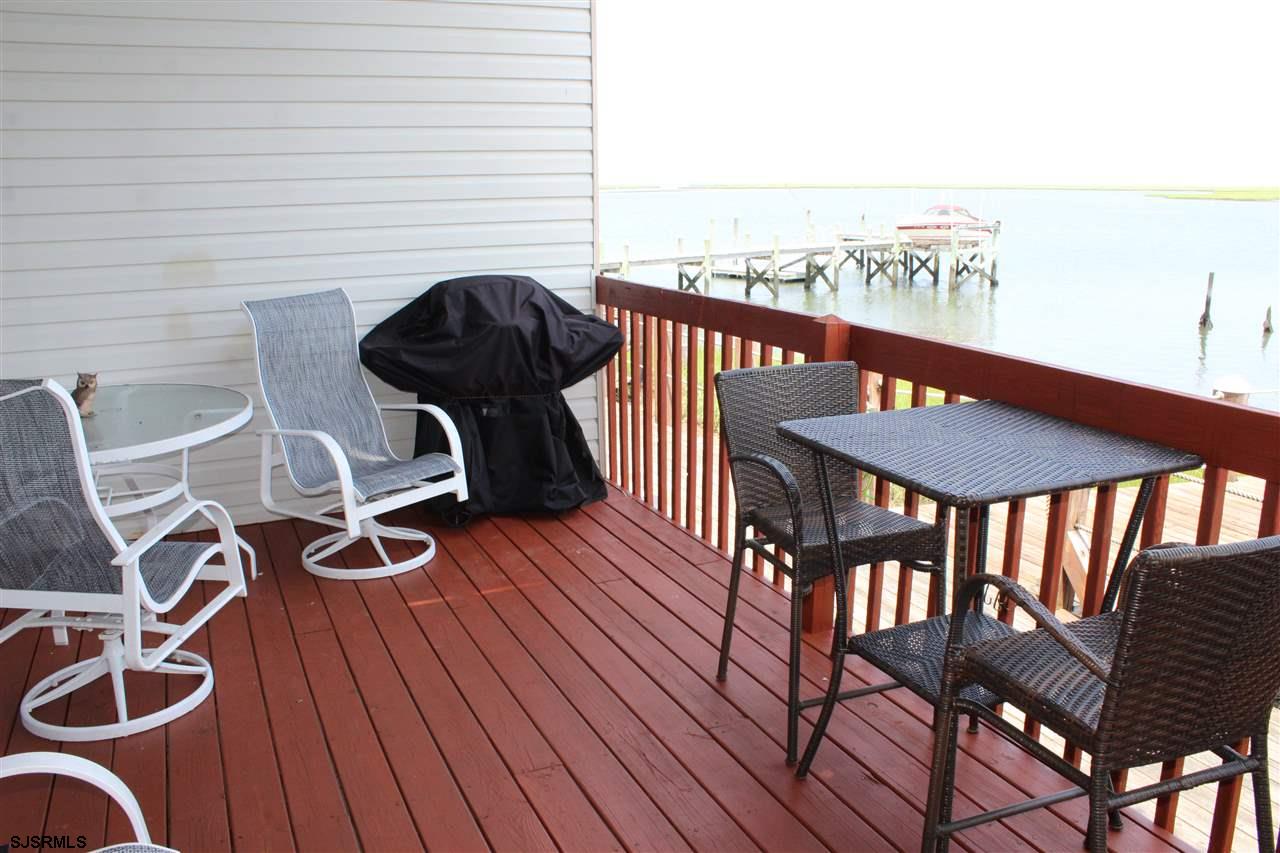 1101 East Shore Drive, Unit C Brigantine, NJ 08203 - Photo 7 of 22 a balcony view with a seating space