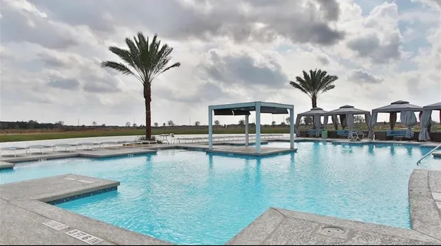 a view of a lake with a garden