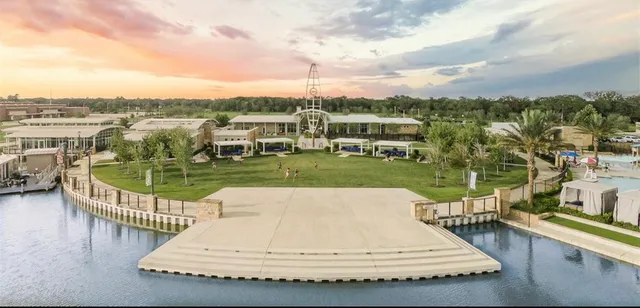 a view of a lake from a balcony