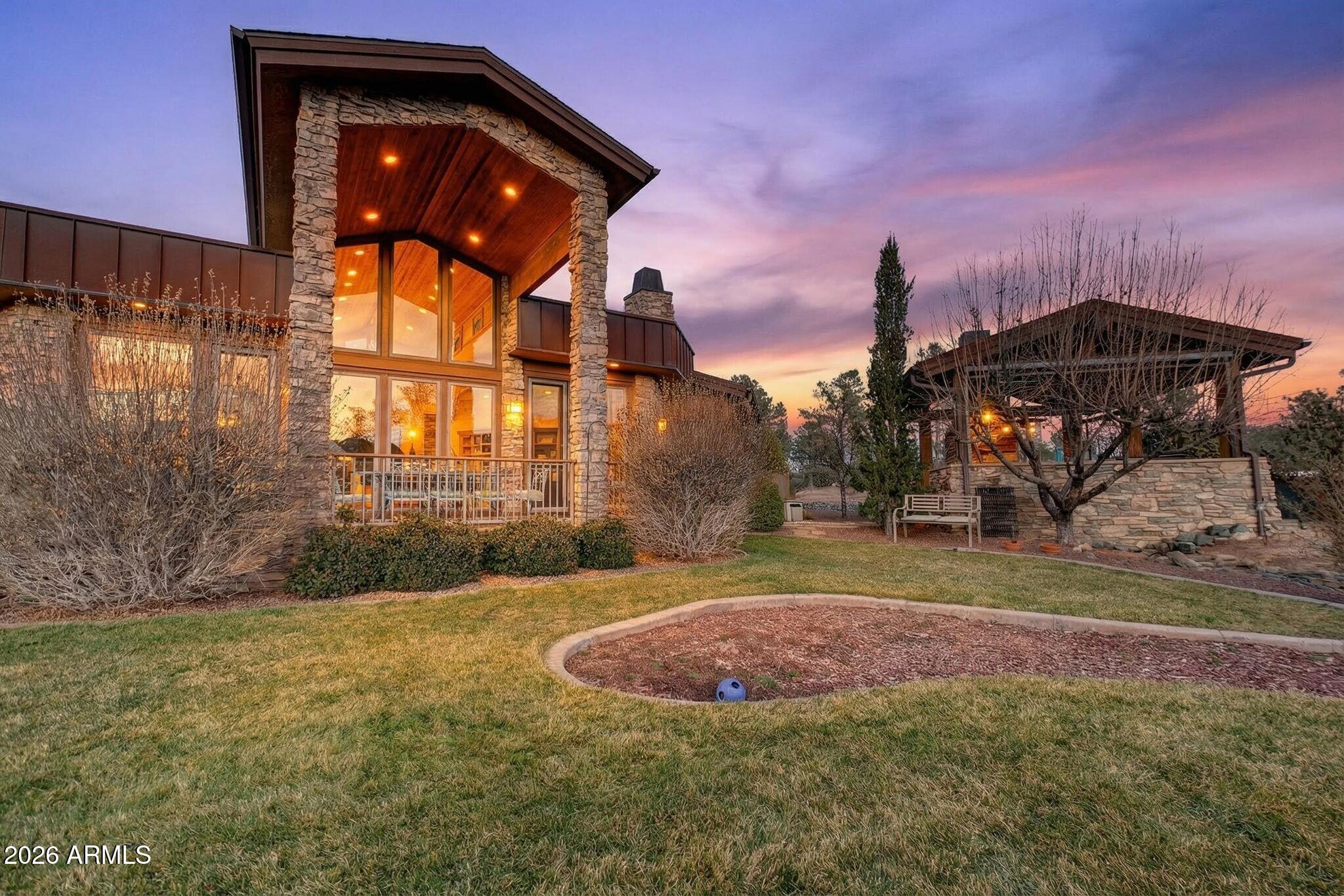 9820 Clear Fork Road Prescott, AZ 86305 - Photo 40 of 75 a front view of a house with a yard