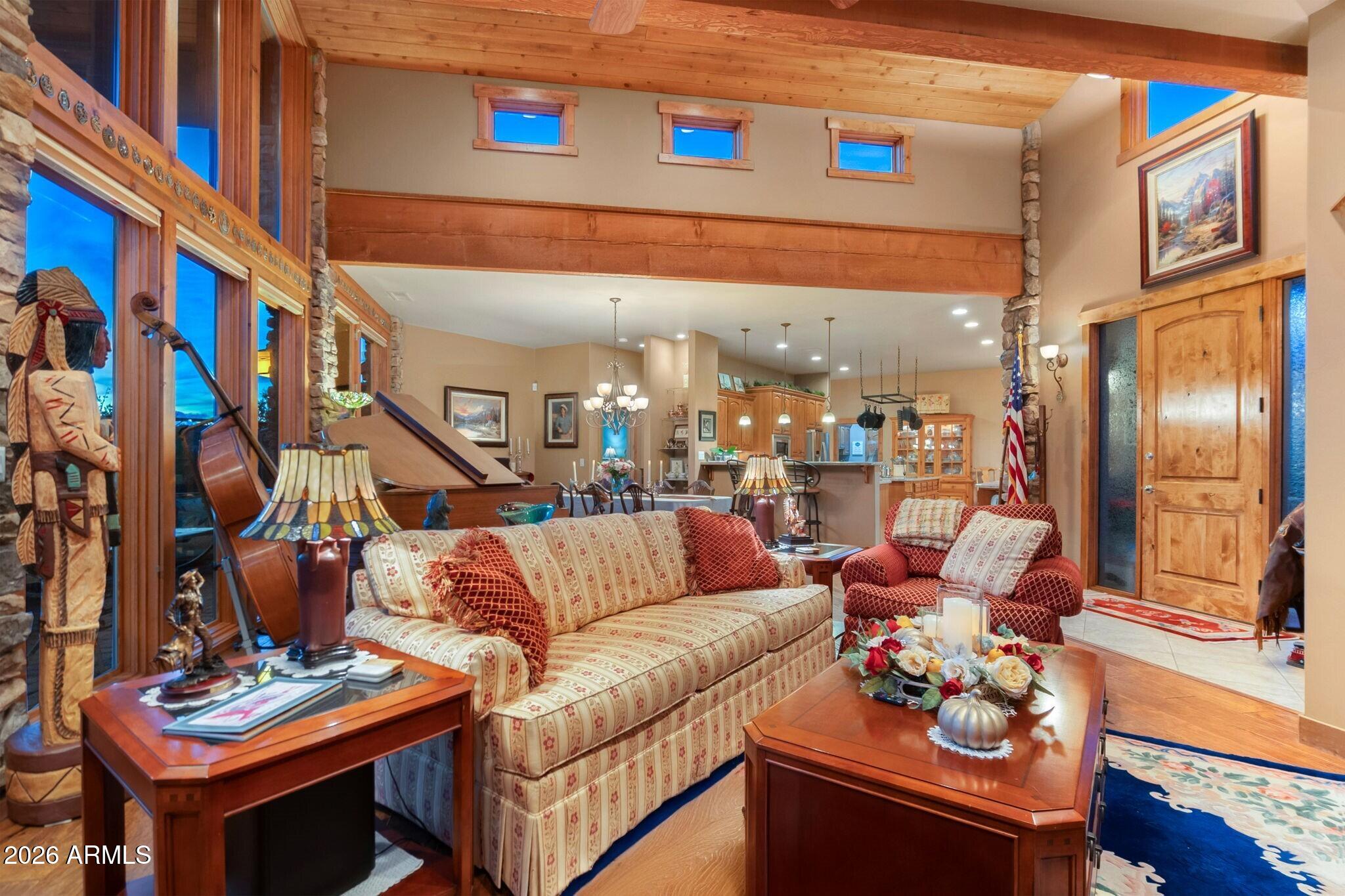 9820 Clear Fork Road Prescott, AZ 86305 - Photo 5 of 75 a living room with furniture fireplace and a flat screen tv