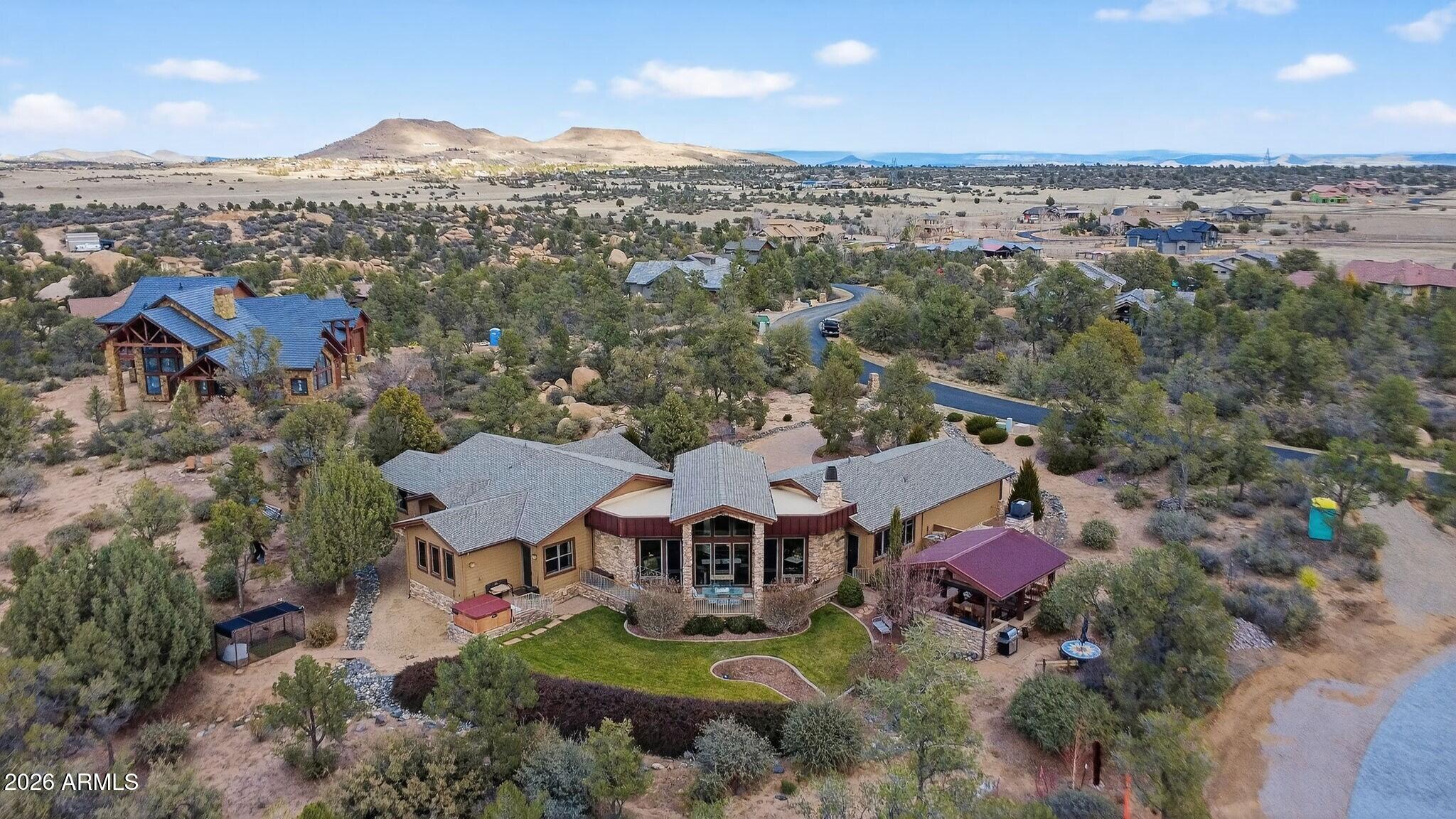 9820 Clear Fork Road Prescott, AZ 86305 - Photo 54 of 75 an aerial view of a house with a mountain in the background