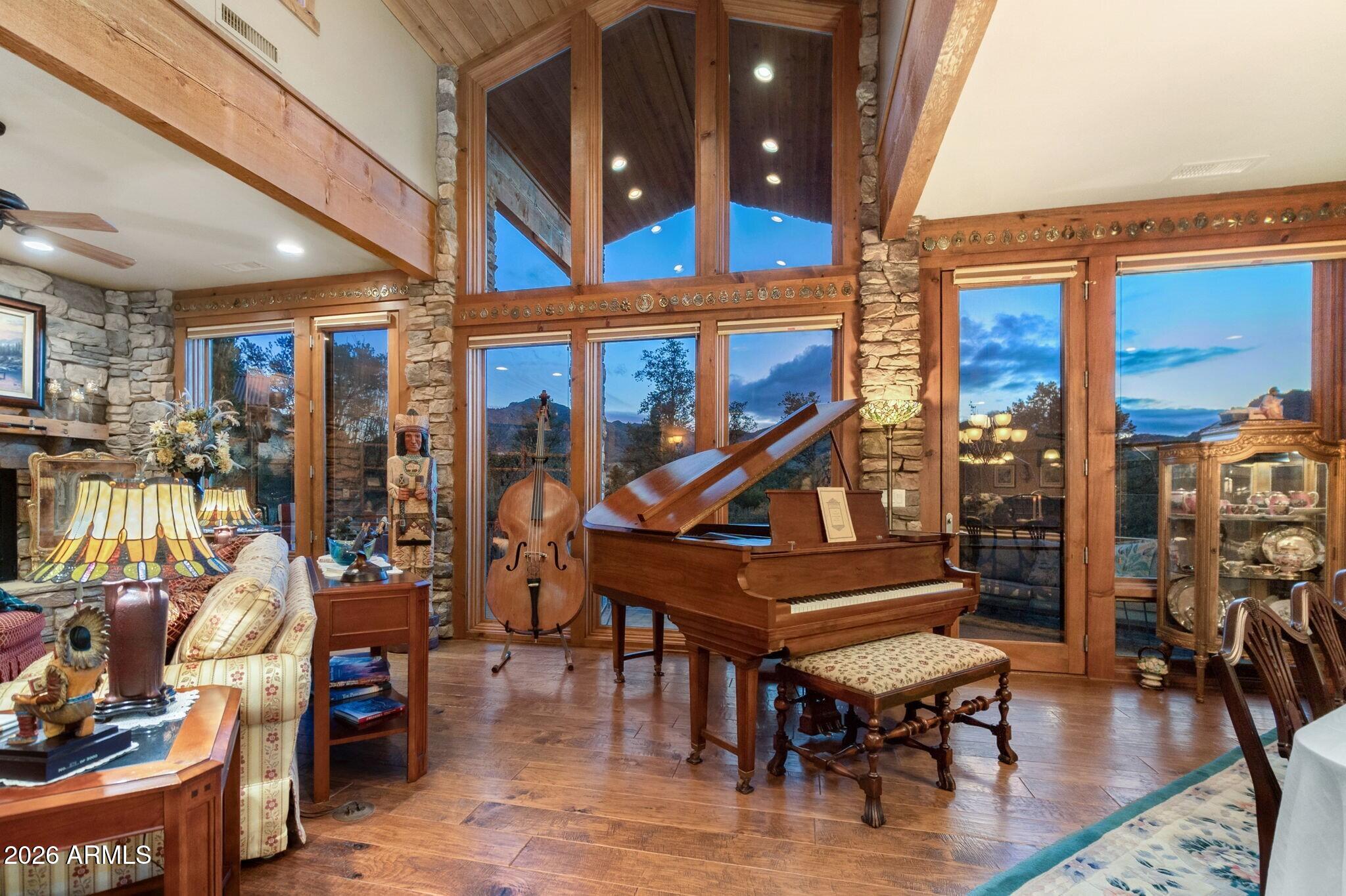 9820 Clear Fork Road Prescott, AZ 86305 - Photo 7 of 75 a living room with furniture a wooden floor and next to a window